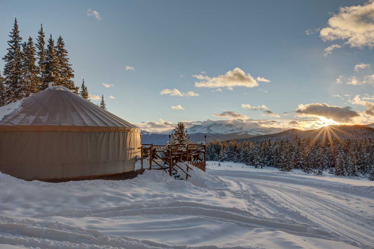 Yurt at Tennessee Pass with mountain sunset in the background