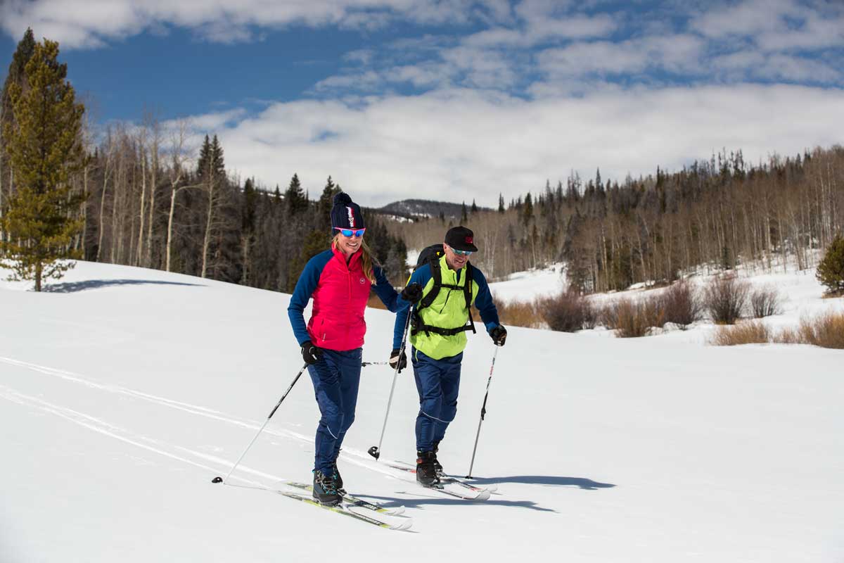 Two nordic skiers on the trails at Snow Mountain Ranch
