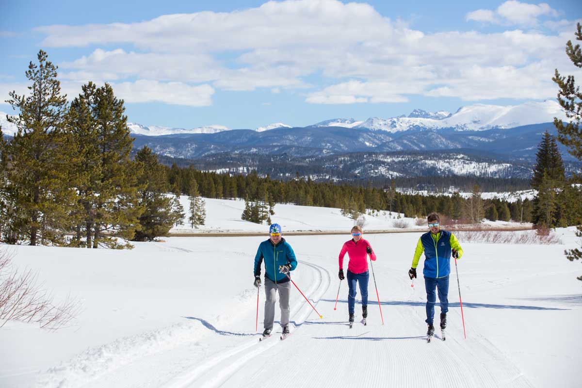 Three nordic skiers on Snow Mountain Ranch's trails