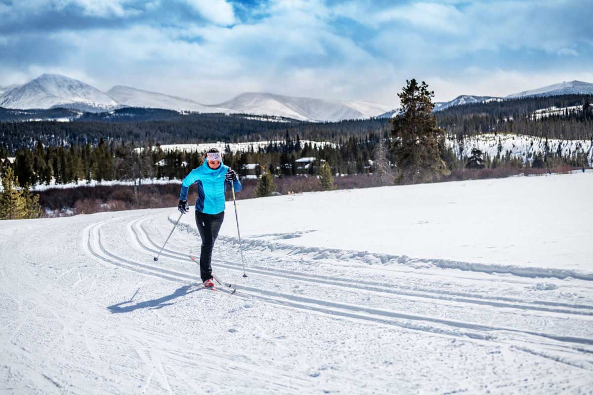 Woman nordic skiing on the trails at Devil's Thumb Ranch